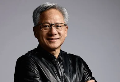 Supplied reference photo of the gray-haired adult man wearing glasses and a black leather jacket