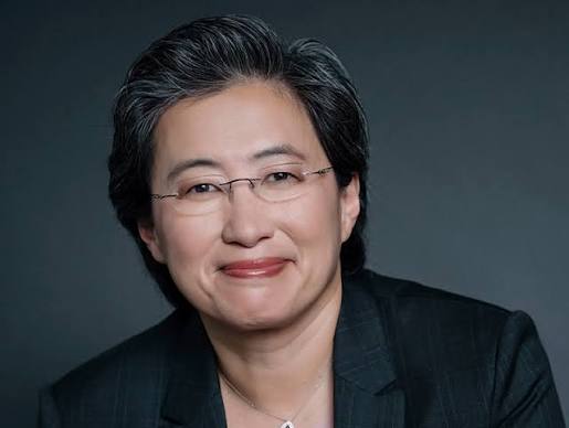 Supplied reference photo of the short-haired adult woman wearing glasses and a dark blazer